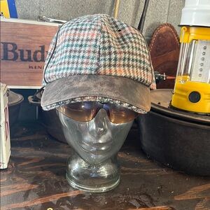 Plaid Cap with Brown Brim, matching strap on back, green and orange lines.